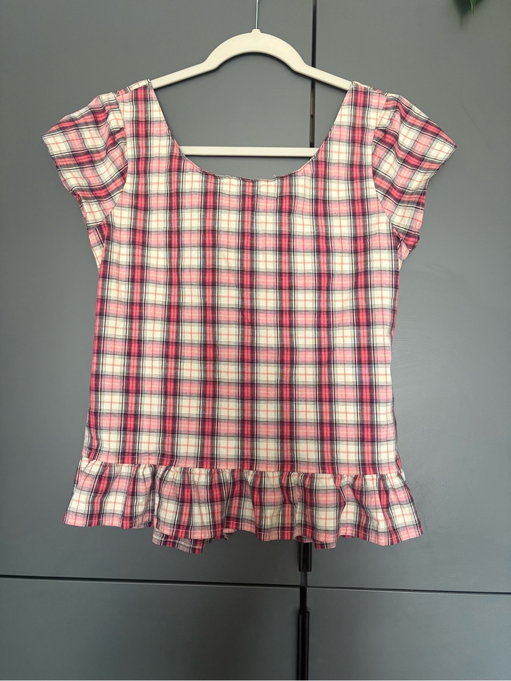 Pink, cream and black Plaid Ruffle Hem Short Sleeve Top with buttons at the back
